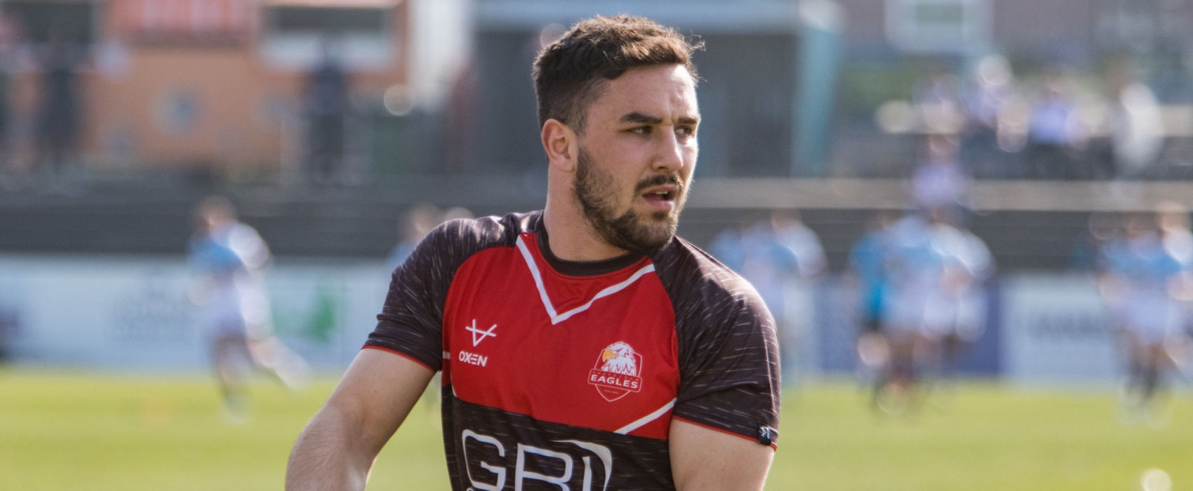 Eagles sign Tom Holmes on permanent deal